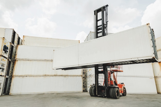 Blank white shipping cargo container loading on forklift truck for transportation shipping and logistic