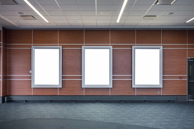 Blank white signboard for advertise on wooden wall in station