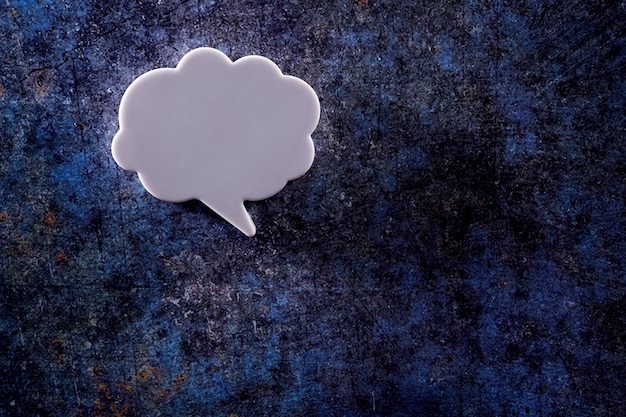 blank white speech bubble isolated on blue background
