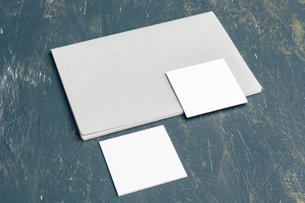 Blank white stationery cards and folder mockup