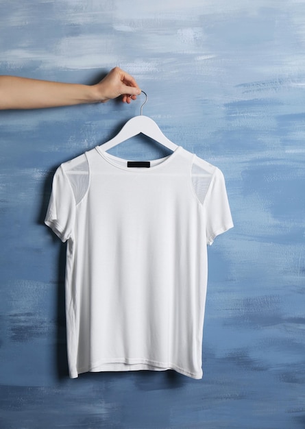 Blank white tshirt against grunge background