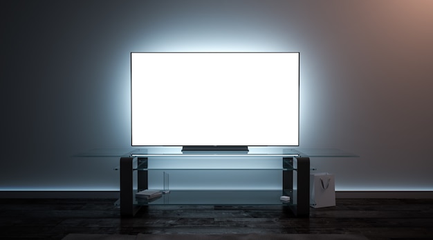 Foto interno dello schermo tv bianco vuoto nell'oscurità