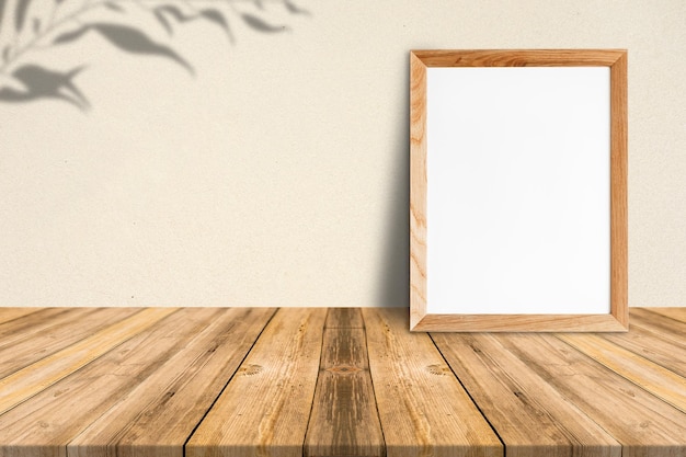 Blank wood frame on tropical wood floor and beige paper wall,template mockup for adding your content