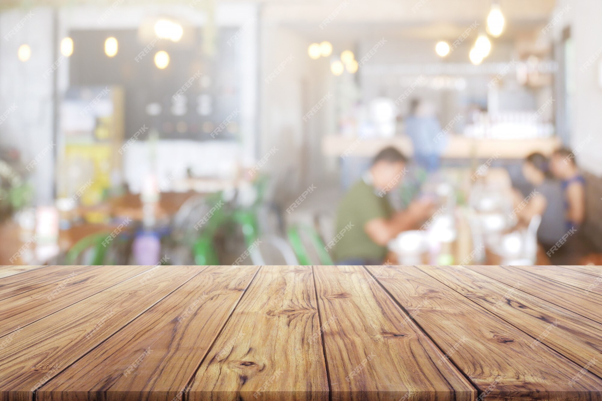 Premium Photo | Blank wood table top with people at restaurant or coffee cafe  background for montage product