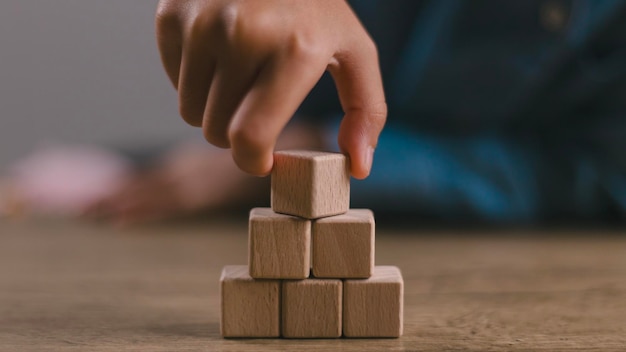 Blank wooden cubes on the table with copy space empty wooden cubes for input wording and an infographic iconx9