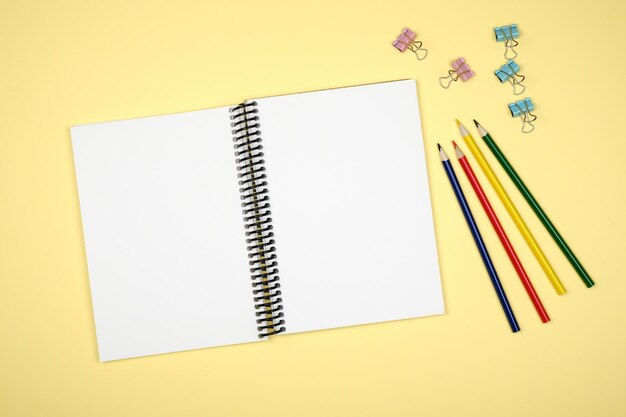 Blank writing pad for ideas on colored background