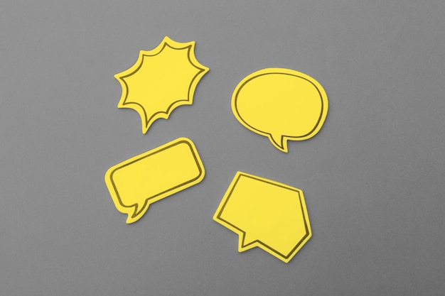 Photo blank yellow empty chat bubble for text