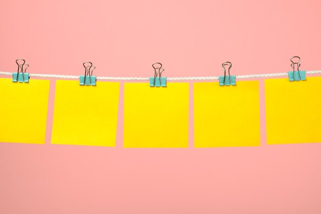 Blank yellow paper notes on the string