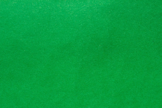 Blanke groene papiertextuur als achtergrondkopieerruimte