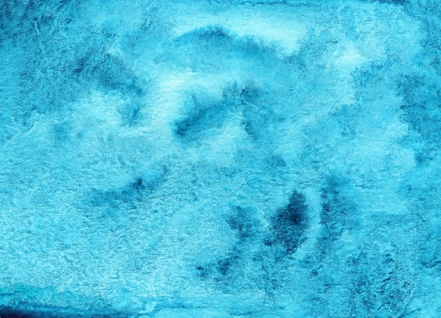 Blauwe abstracte aquarel achtergrond op geweven papier. Handgemaakte aquarel achtergrond