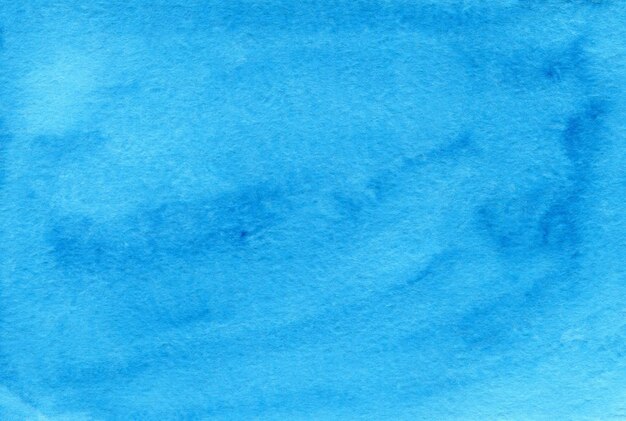 Blauwe abstracte aquarel achtergrond op geweven papier. Handgemaakte aquarel achtergrond