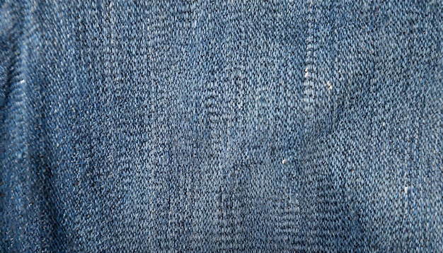 Blauwe achtergrond of textuurpatroon van spijkerbroek