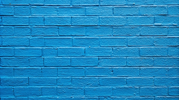 blauwe bakstenen muur met een witte baksteen en een blauwe baksteen achtergrond