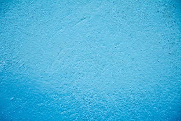 Blauwe de textuurclose-up van de cementmuur