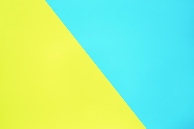 blauwe en gele pastelkleur papier textuur bovenaanzicht minimale platliggende achtergrond