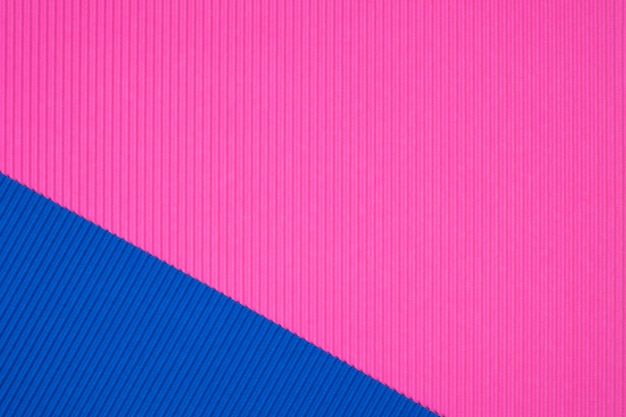 Blauwe en roze golfdocument textuur