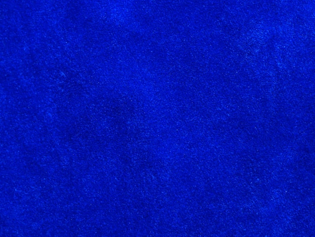 Blauwe fluwelen stof textuur gebruikt als achtergrond Lege blauwe stof achtergrond van zacht en glad textiel materiaal Er is ruimte voor textx9