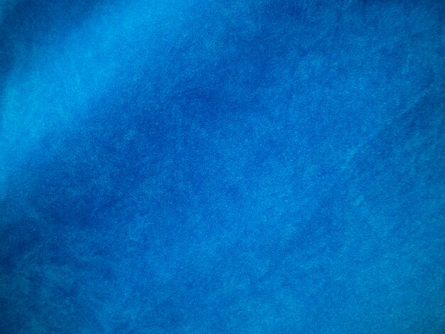 Blauwe fluwelen stof textuur gebruikt als achtergrond Lege blauwe stof achtergrond van zacht en glad textiel materiaal Er is ruimte voor textx9