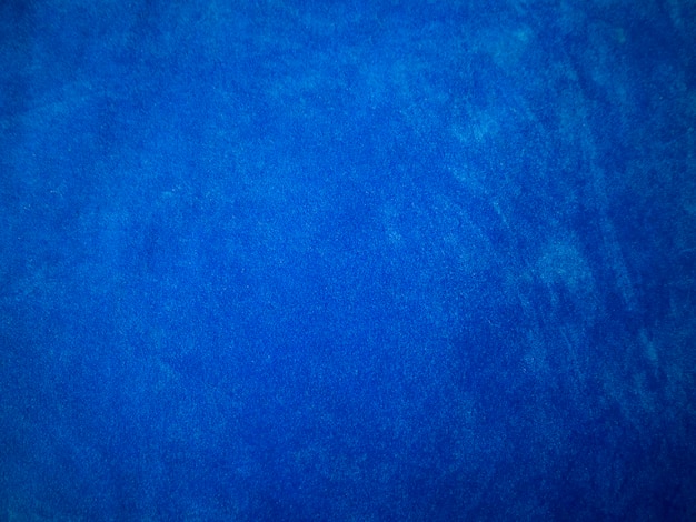 Blauwe fluwelen stof textuur gebruikt als achtergrond Lege blauwe stof achtergrond van zacht en glad textiel materiaal Er is ruimte voor textx9