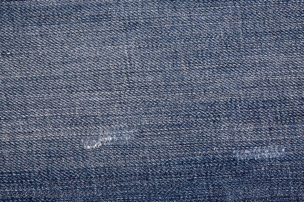 Blauwe jeansstof. Denim jeans textuur of denim jeans achtergrond.