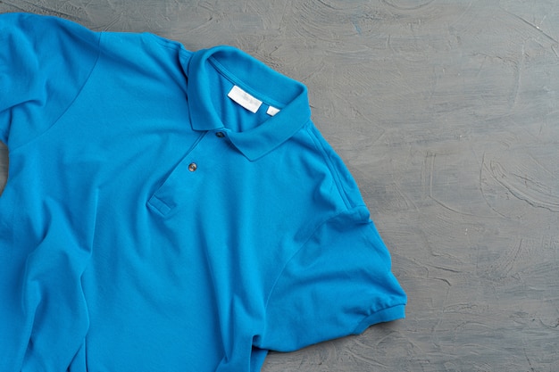 Blauwe katoenen polo t-shirt textuur