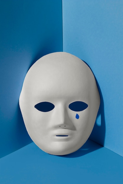 Foto blauwe maandag met tranend gezichtsmasker