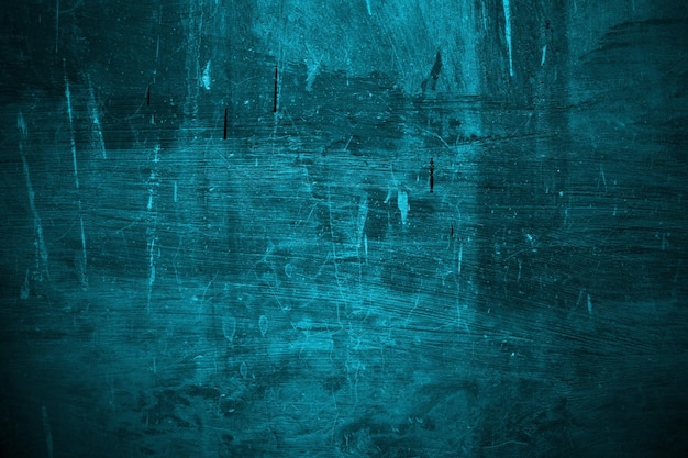 Foto blauwe muur angstaanjagende textuur voor achtergrond donkerblauwe gebarsten cement