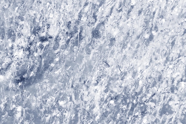 blauwe textuur van gebarsten ijskrassen