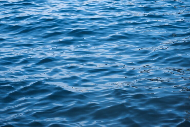 Blauwe zee golf rimpeling krul water oppervlaktestructuur
