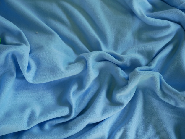 blauwe zijde stof textuur achtergrond, sportkleding kleding, blauwe achtergrond