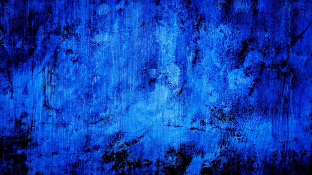 blauwe zwarte textuurachtergrond van verontrust muurbeton