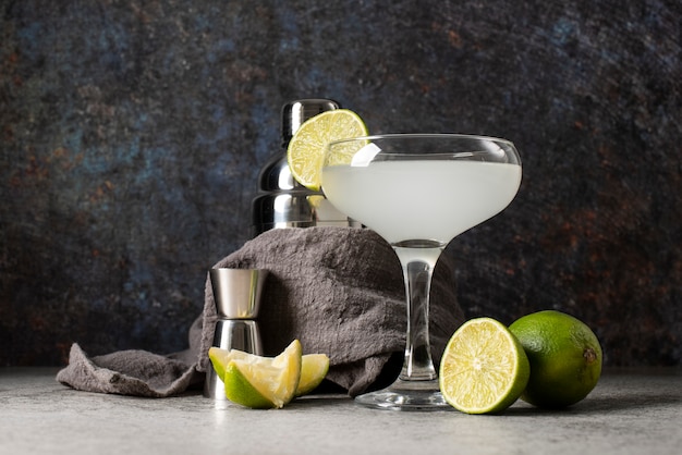 Blend of refreshing cocktail with lime slices