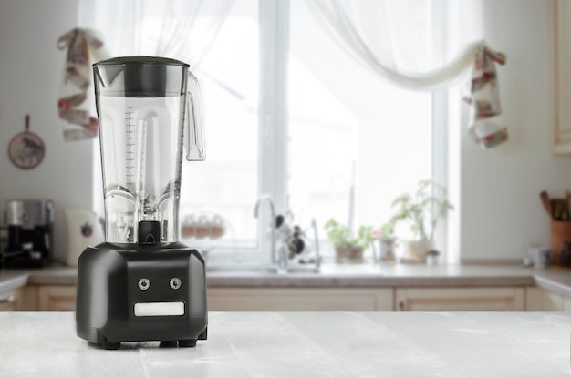 Photo blender and wooden table in kitchen. do smoothies