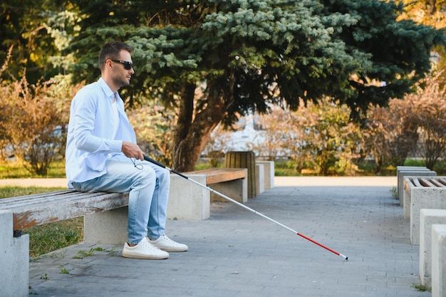 Blind man with a walking stick