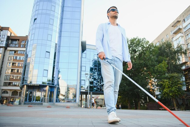 Blind man with a walking stick