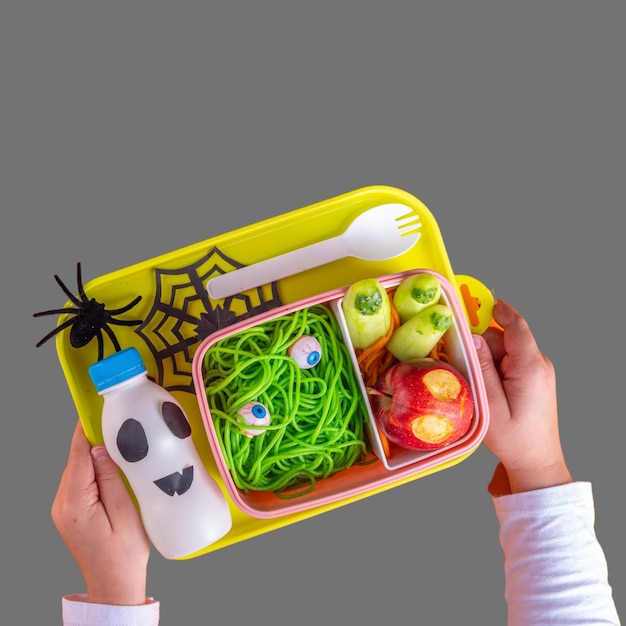 blind stock Afbeeldingen De lunchbox van Halloween-schooljonge geitjes