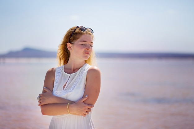 Blindly go on nature the Girl's portrait at the salty lake