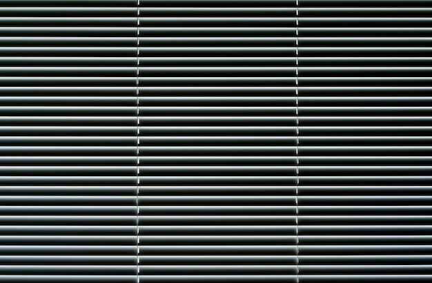 Blinds background window with metal shutters in the interior of the living room high quality photo