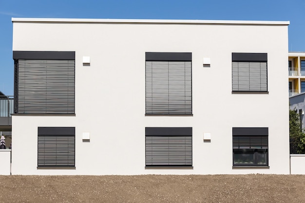 Blinds on Windows of Modern House Modern Exterior Facade of Apartment Building with Roller Shutters