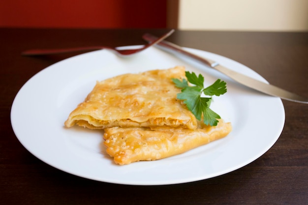 A blini, or sometimes blin, is a Russian and more broadly Eastern European pancake