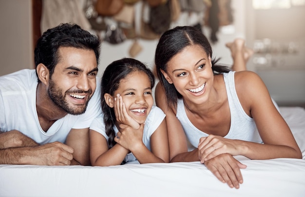 Blissful family moments Portrait of a happy family bonding together at home