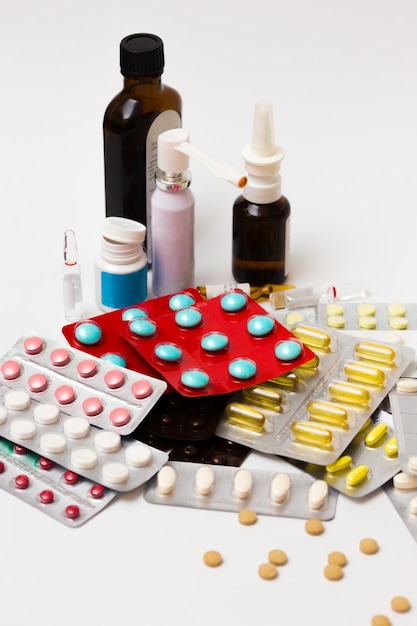 Blister with medicine pills on a white background