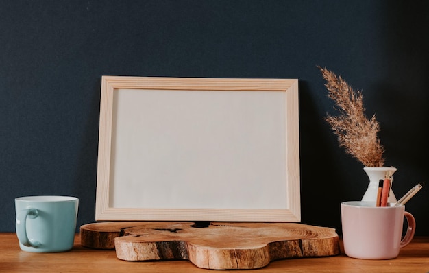 blnak white frame on the wooden slice