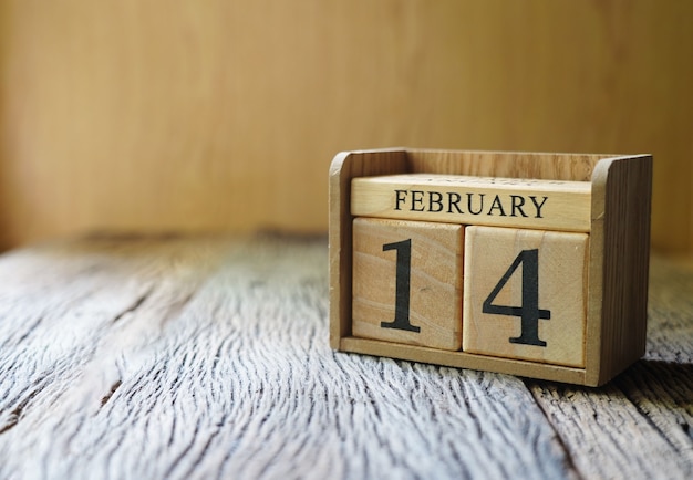 Block date 14 February on wooden table , valentine's day  love concept