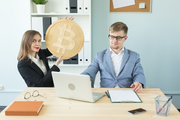 Blockchain, crypto currency and web money concept - Portrait of business woman and man holding