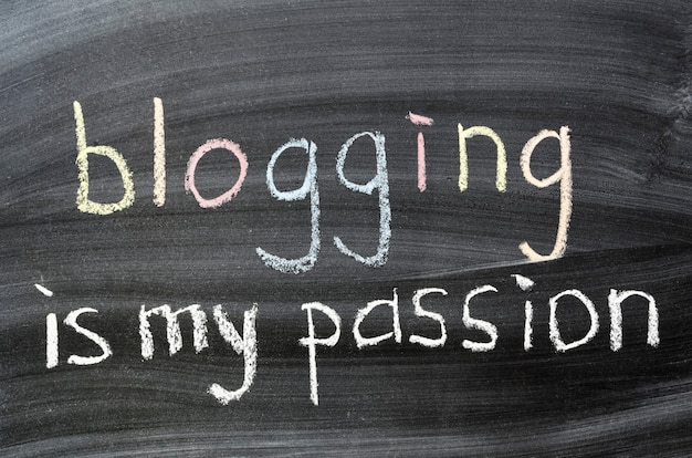 Blogging is my passion phrase handwritten on blackboard