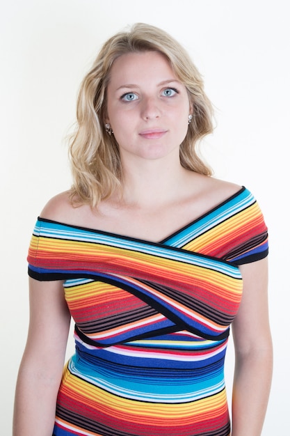 Blond and beautiful woman with colored dress