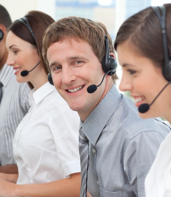 Blond businessman smiling at the camera 