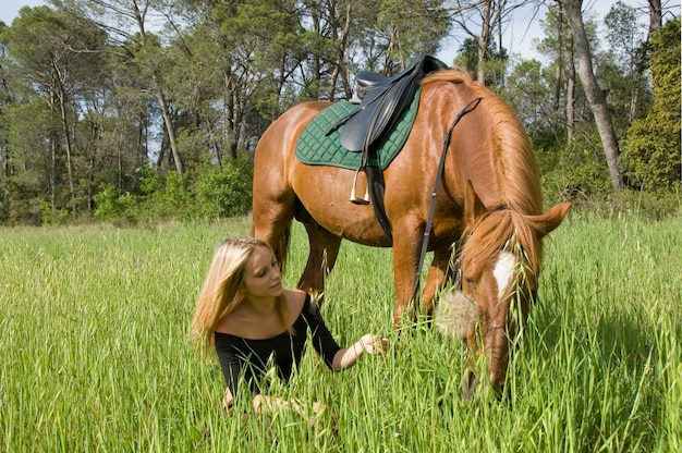 Blond girl and her stallion