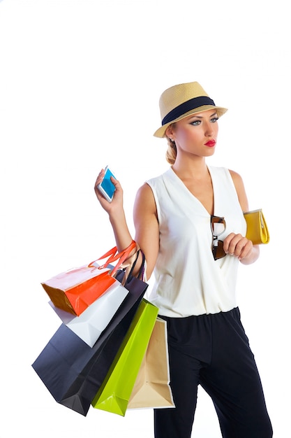 Blond shopaholic woman bags and smartphone